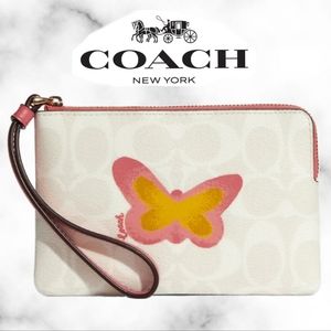 Coach Wristlet In Signature Canvas With Butterfly